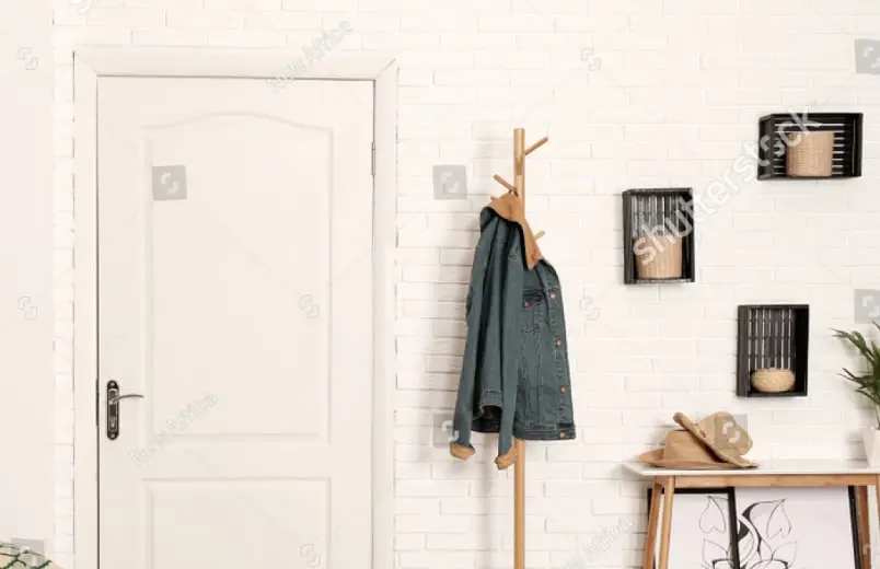 Interior paneled door with a coat rack