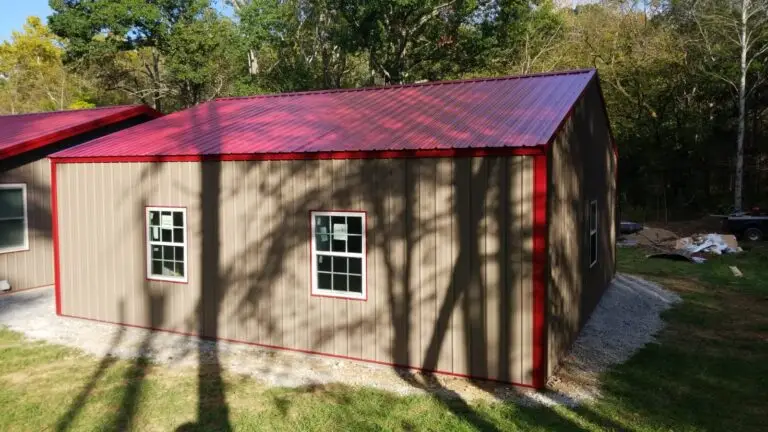 Side of the 30 x 30 x 9 garage with a window, tan siding and red roof