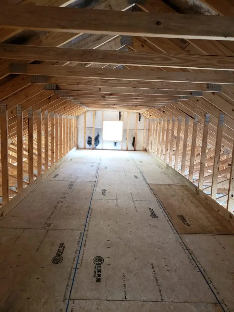 Wood-framed side shed of the 30 x 40 x 12 garage with side shed during construction