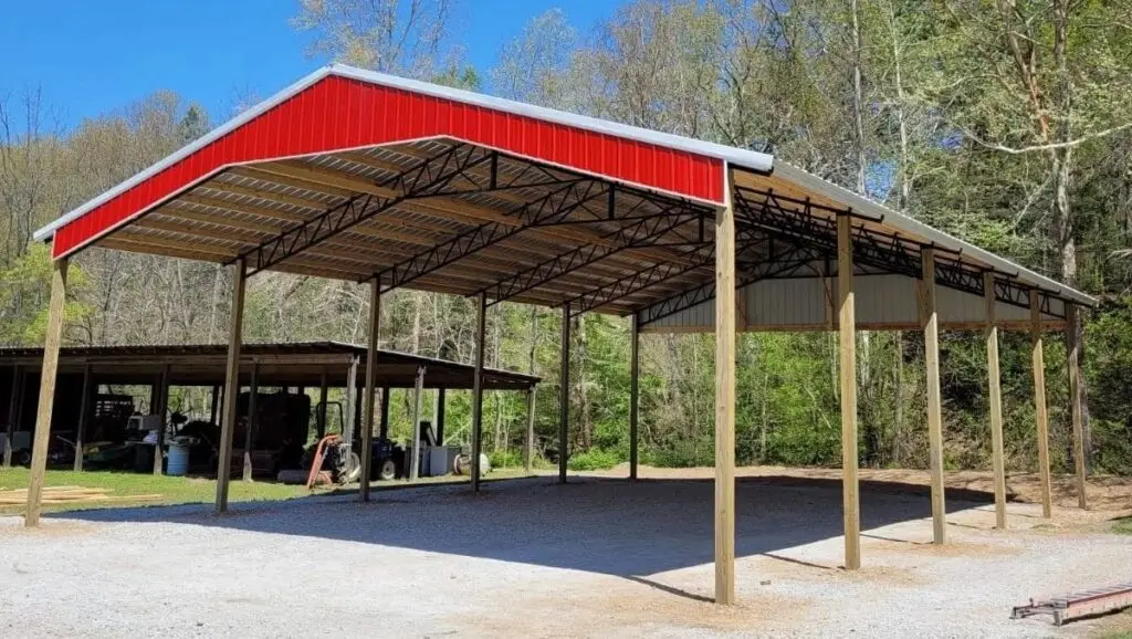 40 x 60 x 14 hay barn, open-sided pole barn with a red roof