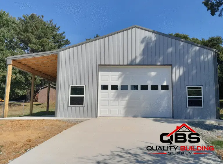 30 x 30 x 12 garage with lean to with a white garage door and windows