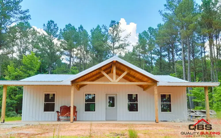 The Barham Home, white board-and-batten with a timber gable porch