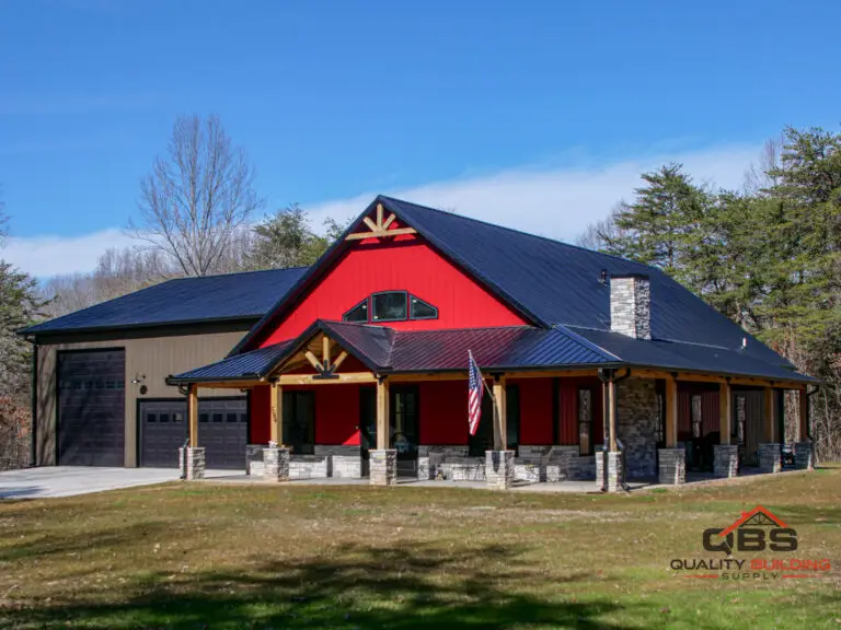 The Fireside Barndo, red gable with timber accents and a long porch
