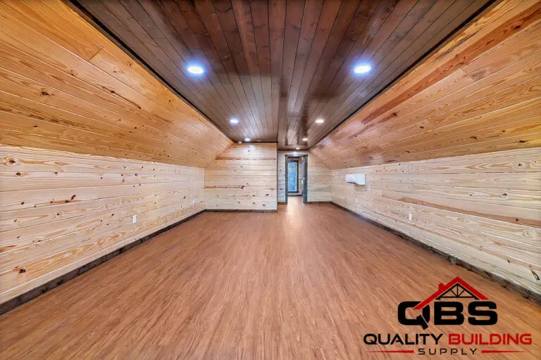 Hallway with a wood ceiling and shiplap walls in the South Fork Barndo