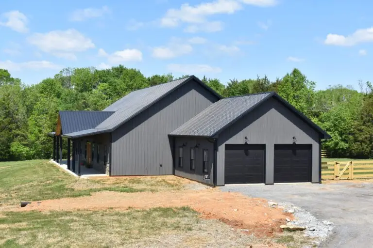 Tubberville Home with black garage doors