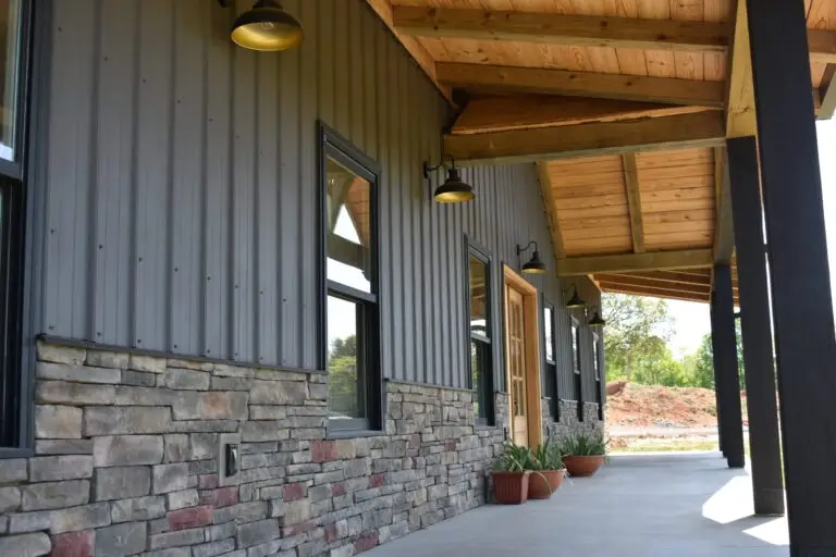 Tubberville Home entry porch with stone wainscot