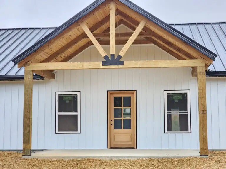 Timber gable entry and wood front door on the Viewpoint barndominium