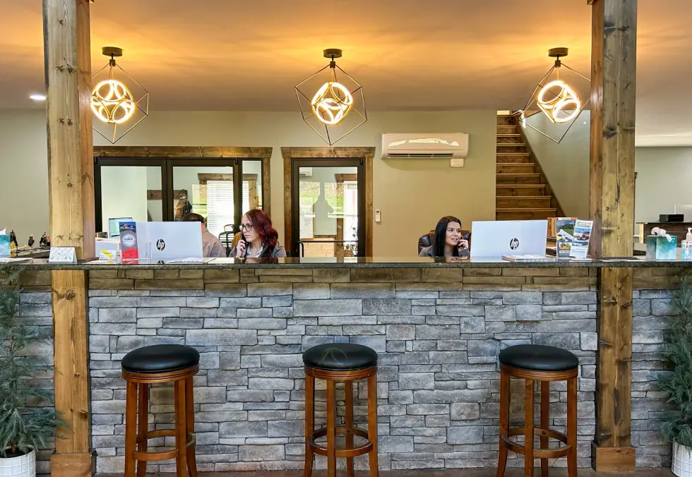 Quality Building Supply showroom front desk with stone counter