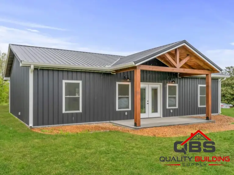The Oak Hill Barndo, gray board-and-batten with a timber gable porch