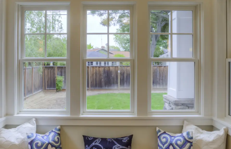 Double-hung windows with white trim