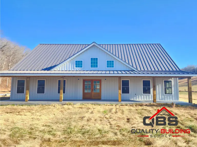 The Richland Hollow barndominium, white farmhouse with a front porch