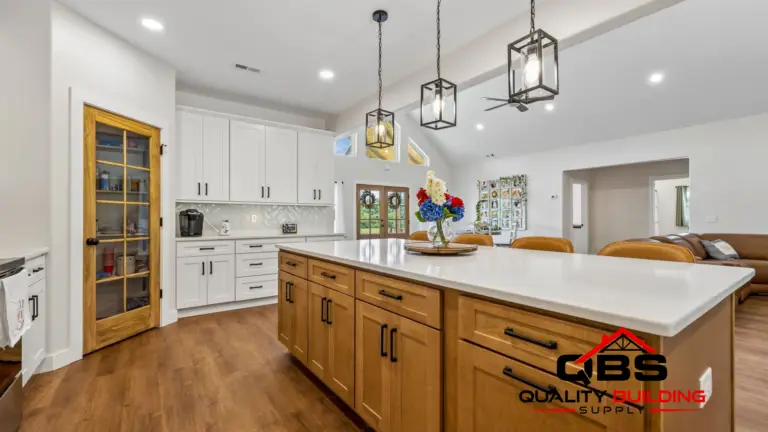 Kitchen island with lantern pendants in the Cypress Ridge barndominium