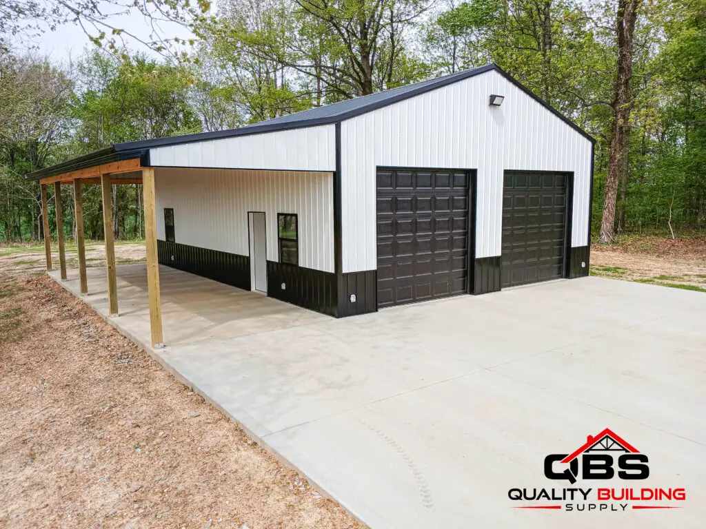 30 x 40 x 12 garage, white with black wainscot, two garage doors and a porch