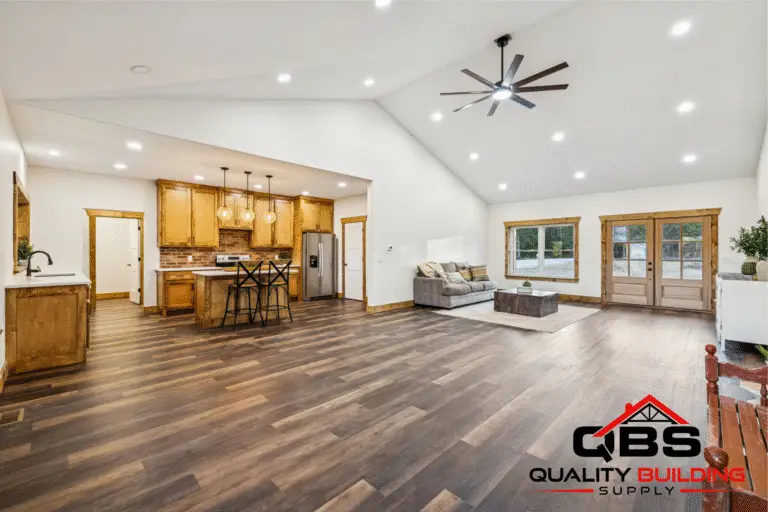 Great room with a ceiling fan in the Ozark barndominium