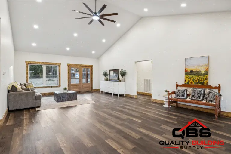 Living area with a ceiling fan in the Ozark barndominium