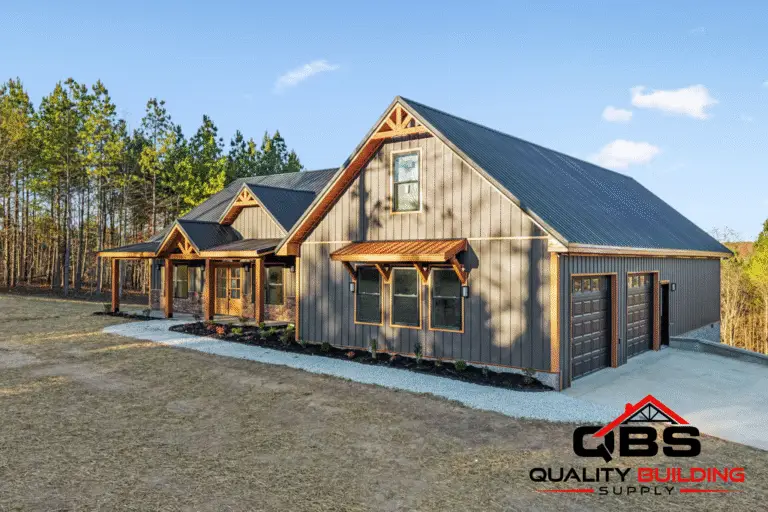 Timber gable and metal roof on the Ozark barndominium