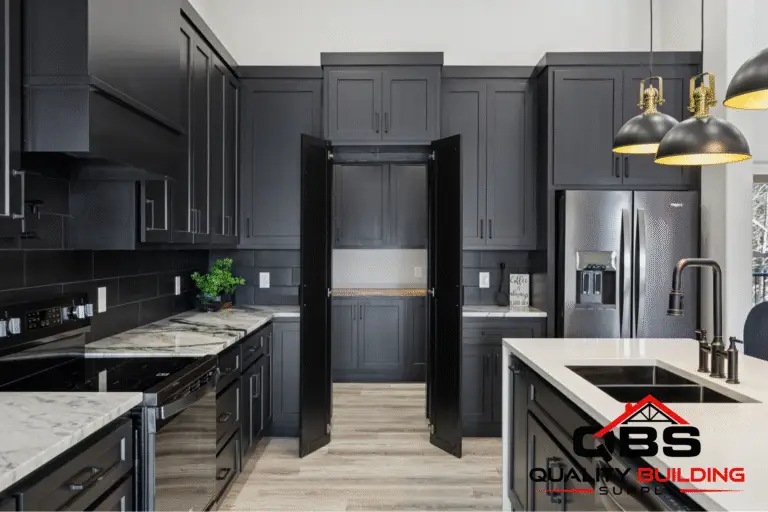 Kitchen with black cabinets in the Ironwood barndominium