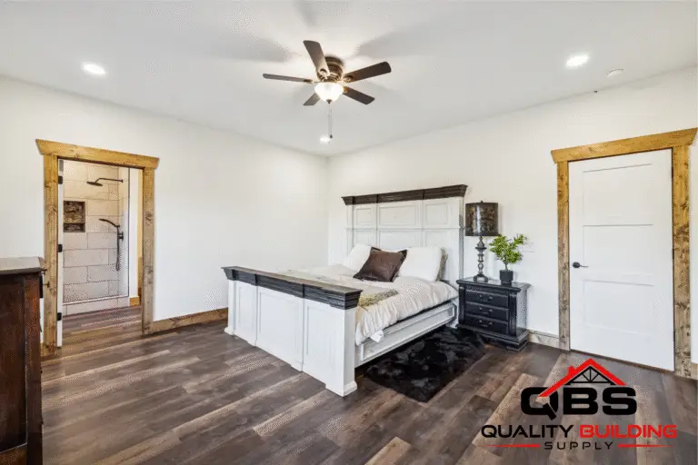 Bedroom with a ceiling fan in the Ozark barndominium
