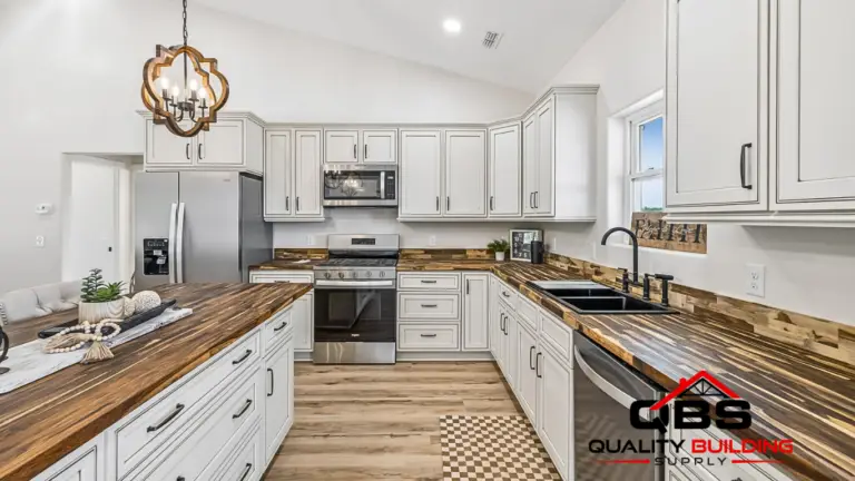 Kitchen with white cabinets and stainless appliances in the Cobalt Combo