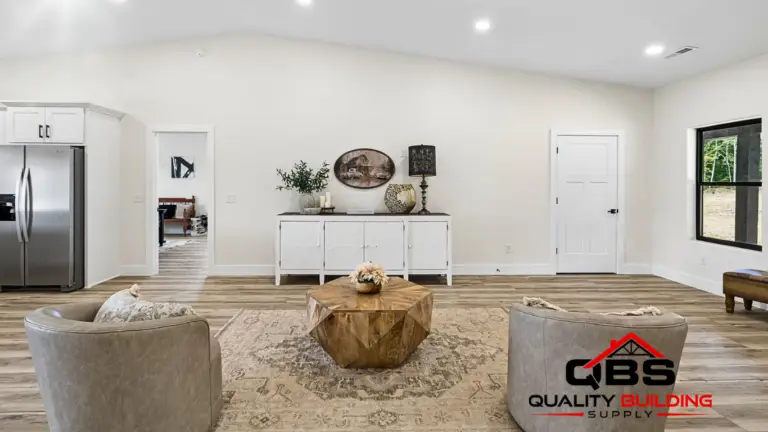 Living room with round coffee table in the Smith V2 barndominium
