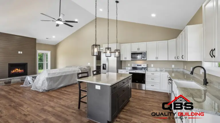 Kitchen with an island and pendant lights in the Shady Grove barndominium